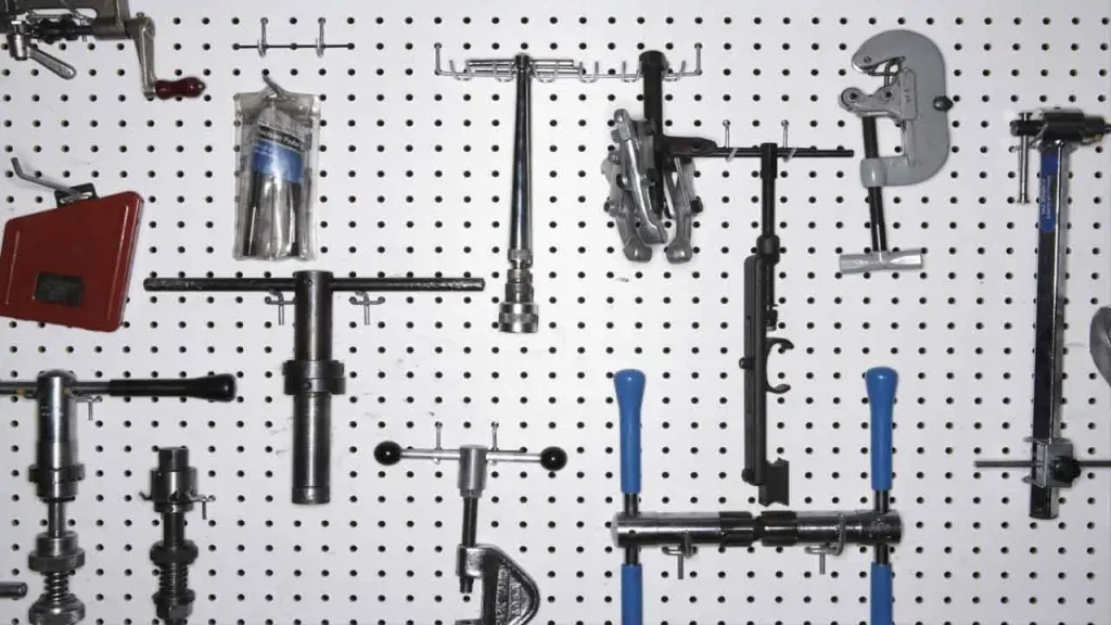 Use a Metal Pegboard for Tools Visibility 