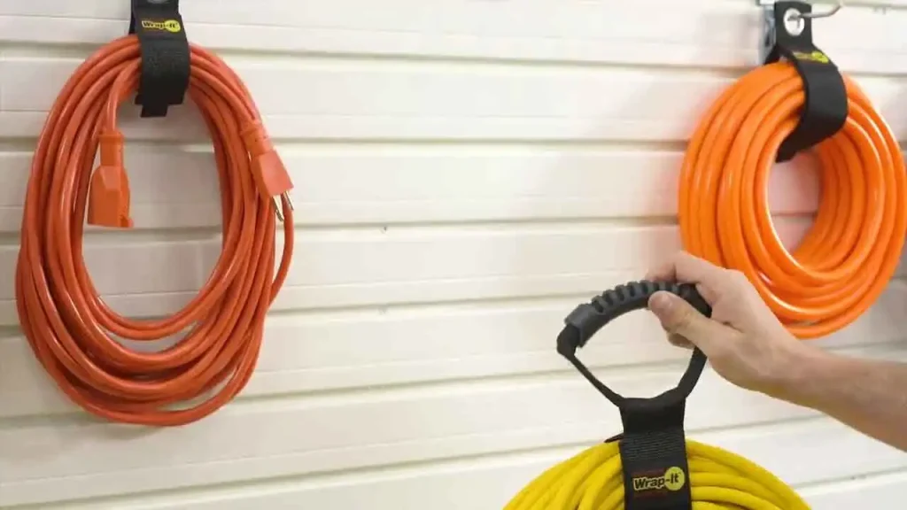 Use Magnetic Hooks to Hang Extension Cords and Garden Hoses